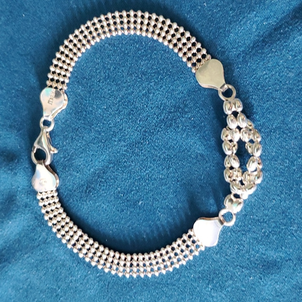 Silver bracelet.